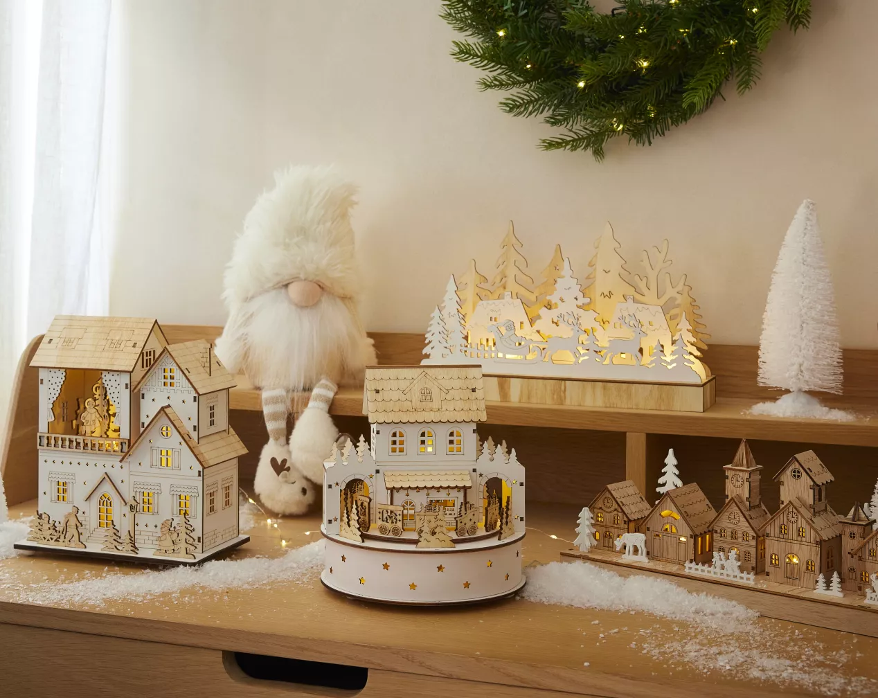 pueblos navideños luminosos de madera