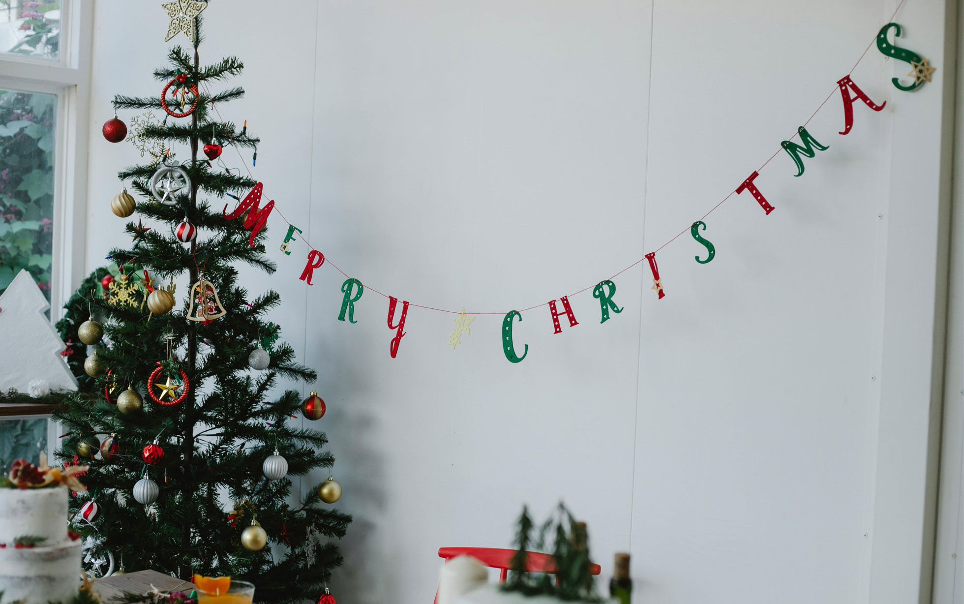 Ghirlanda di Natale con messaggio "Buon Natale"