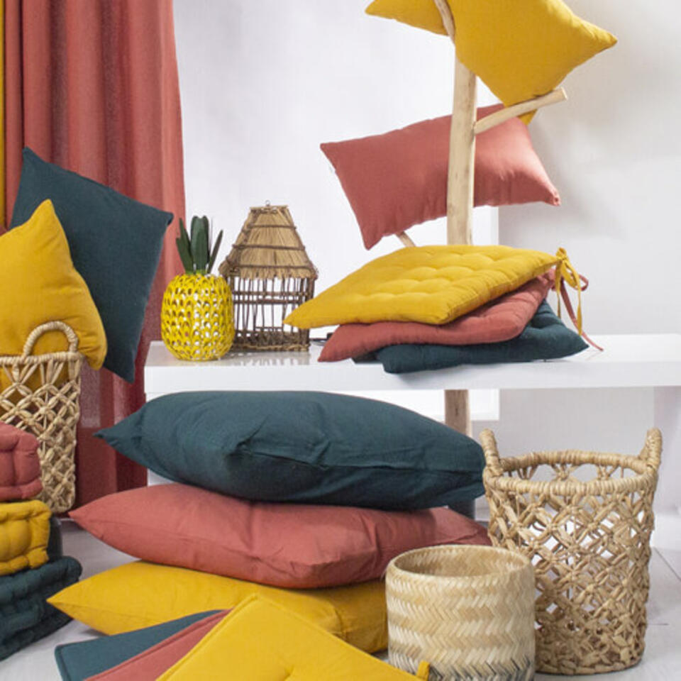 coussins couleur terracotta et jaune épicé