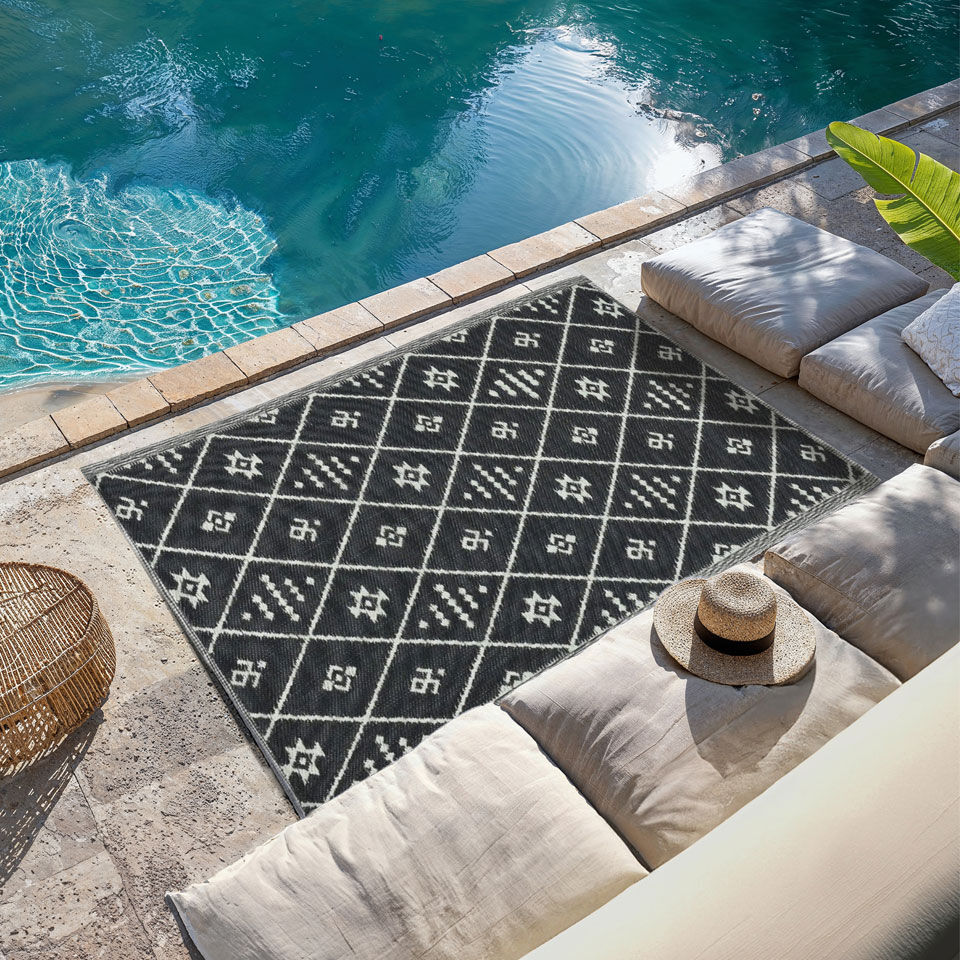 tapis exterieur à motifs ethniques bleu