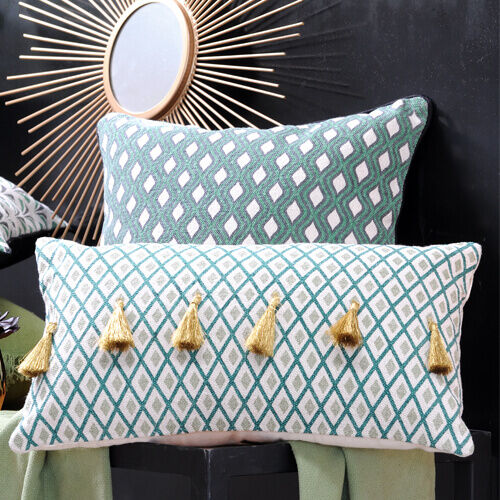 cuscino verde con pompon