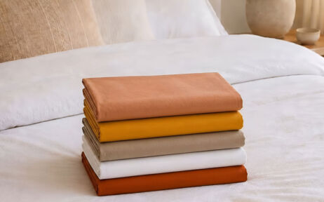 pile de draps housse pliés