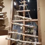 https://cdn1.eminza.com/uploads/cache/legacy_product_150_standard/uploads/media/64ff0b9d6bc5b/sapin-a-suspendre-a-piles-en-bois-branche-illuminee-star-blanc-chaud-2