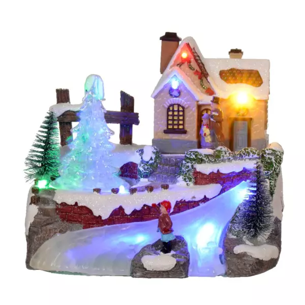 Villaggio di Natale luminoso Serata d'inverno a pile