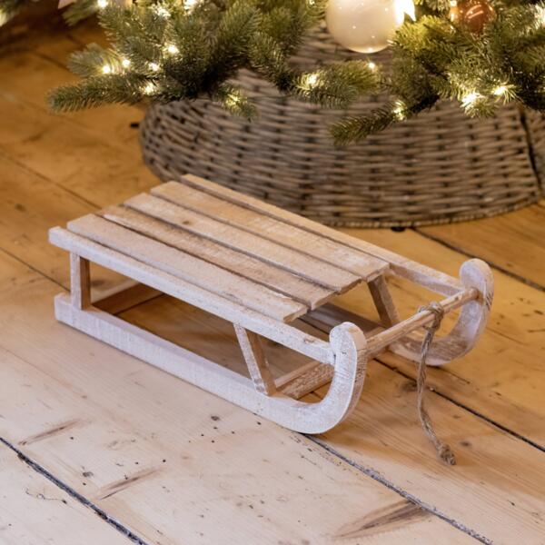 Ange de Noël pour sapin en bois, assis sur un coeur