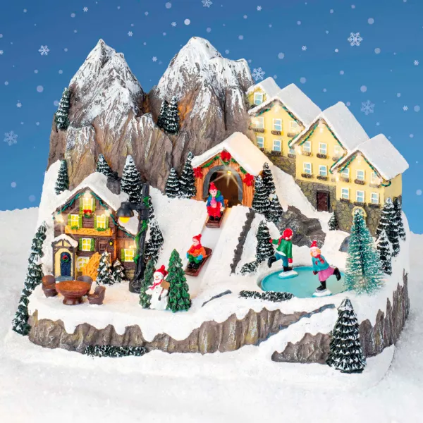 Verlicht en muzikaal kerstdorp Bergchalets