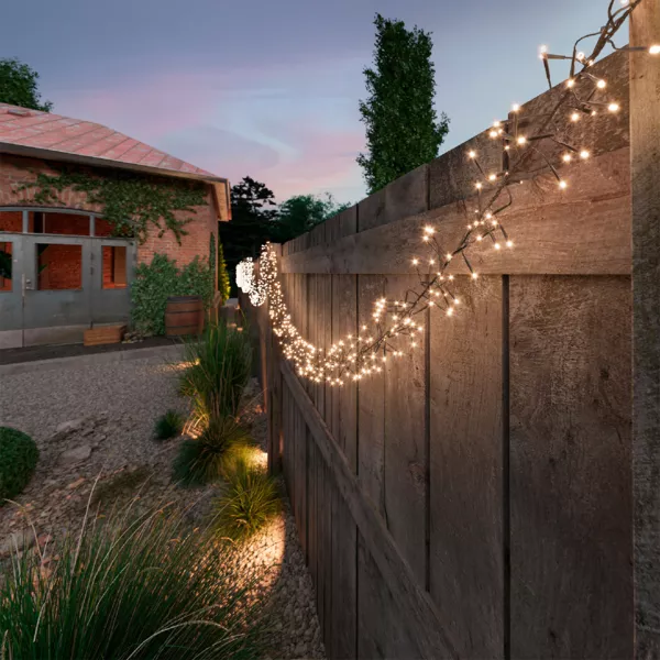 Oplaadbare Zonne-lichtslinger 10,50 m 1128 LED zwart snoer Warm witte tros