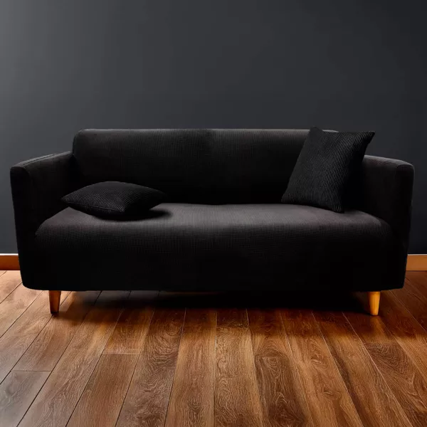 Stretch-Sofabezug mit Waffeleffekt (225 x 245 cm) Sacha Schwarz