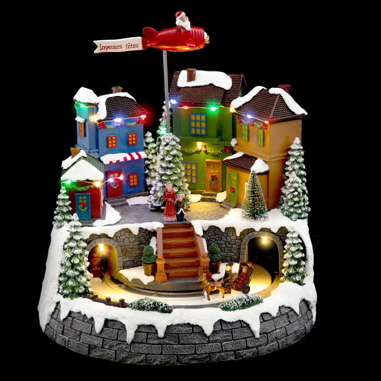 Villaggio di Natale luminoso Aereo di Babbo Natale