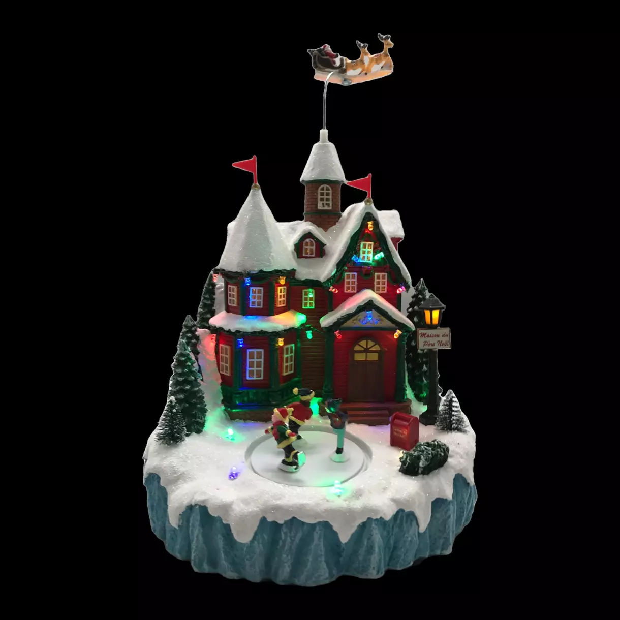 Maison de village illuminée et musicale du Père-Noël 1