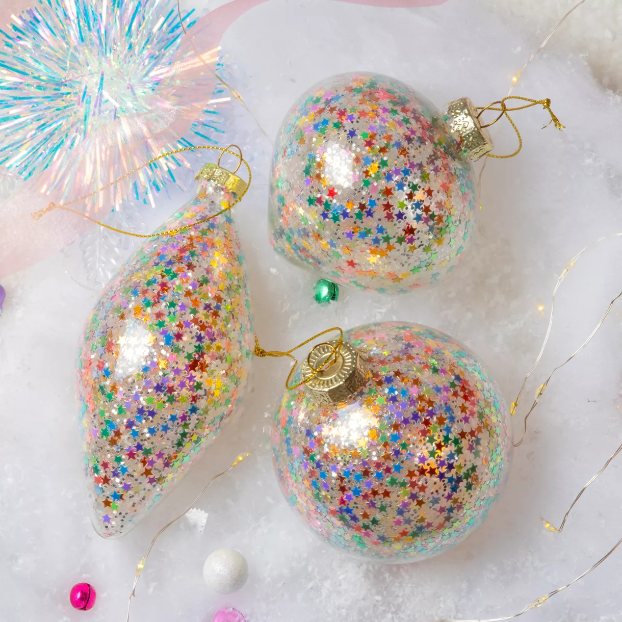 Lot de 12 suspensions en verre (D80 mm) Paillettes étoilées Multicolores