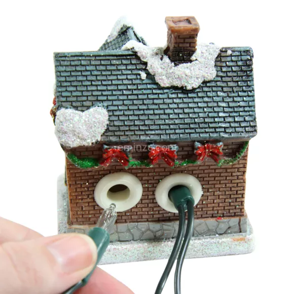 Conjunto completo pueblo iluminado de Navidad escocés
