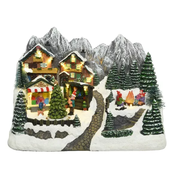 Scène de vie illuminée et musicale village enneigé