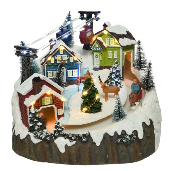 Villaggio di Natale luminoso e musicale vacanze alla neve 2