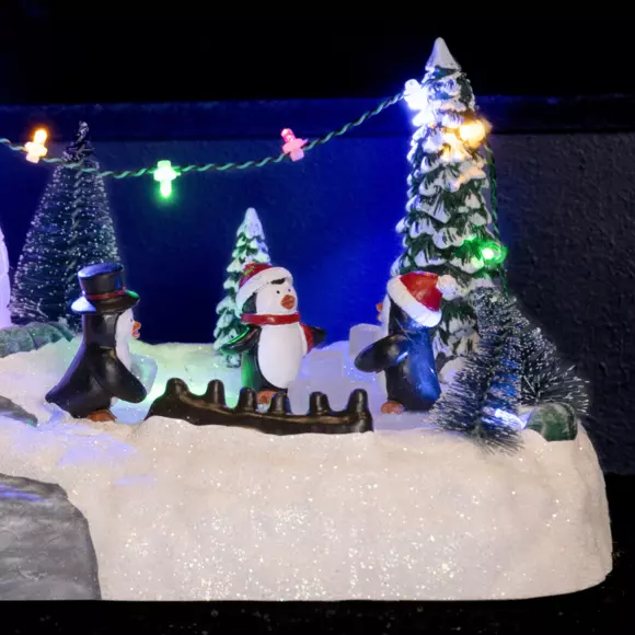 Escena de vida iluminada Parque infantil de los pingüinos a pilas  3