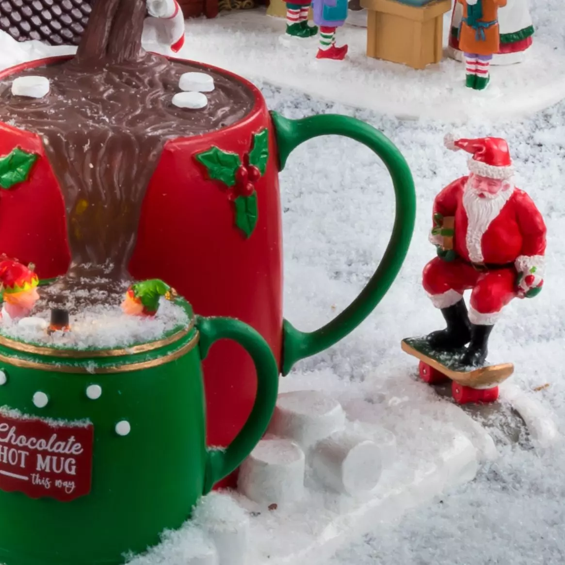 Personaggio Lemax Babo Natale in  skate