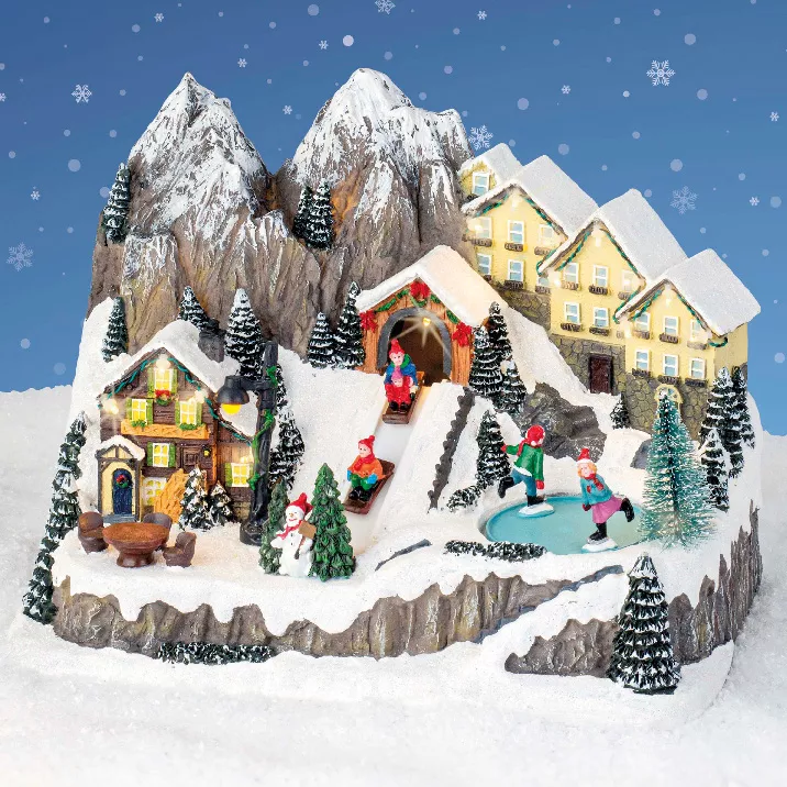 Villaggio di Natale luminoso e musicale Chalet in montagna