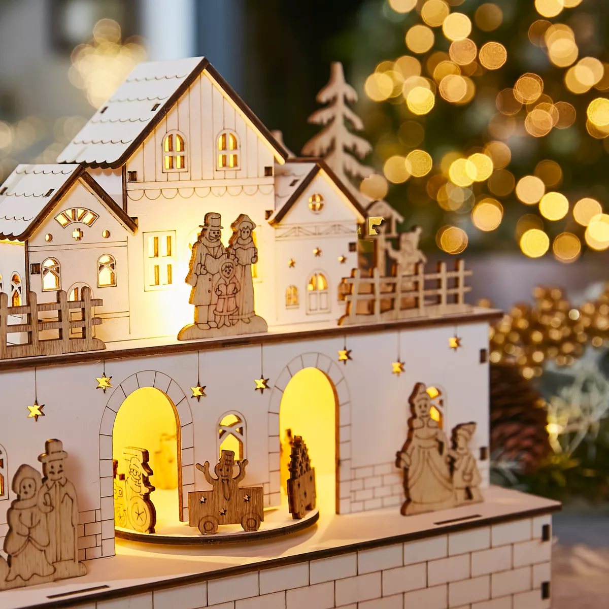 Villaggio di Natale in legno luminoso e musicale a pile (21 x H24 cm) Villaggio in festa