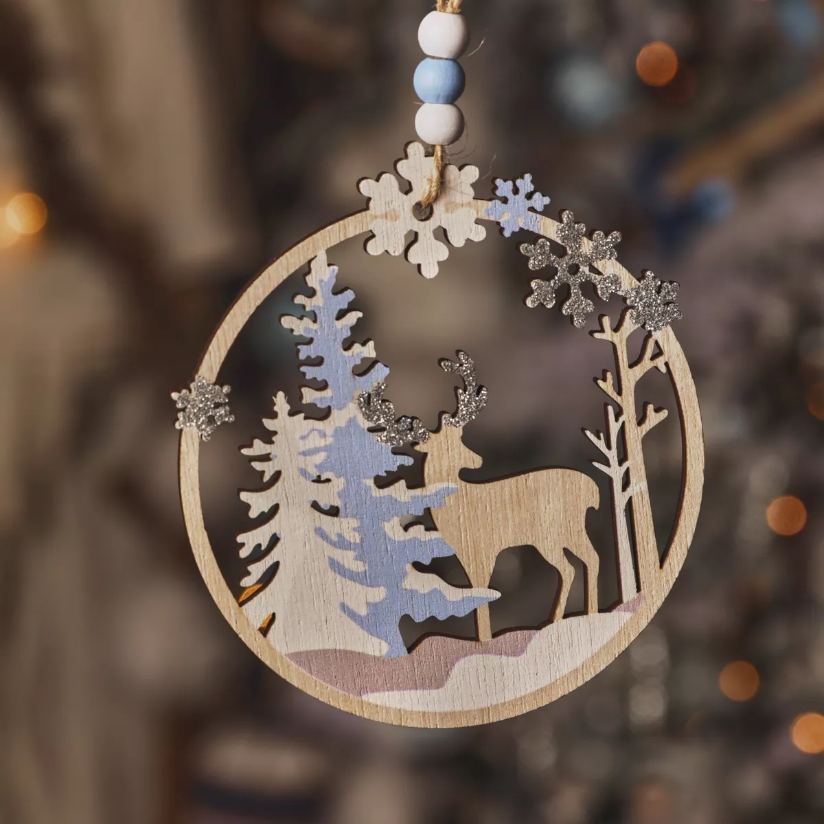 Decorazione natalizia in legno a sospensione (D11 cm) Renna nel bosco Azzurro chiaro