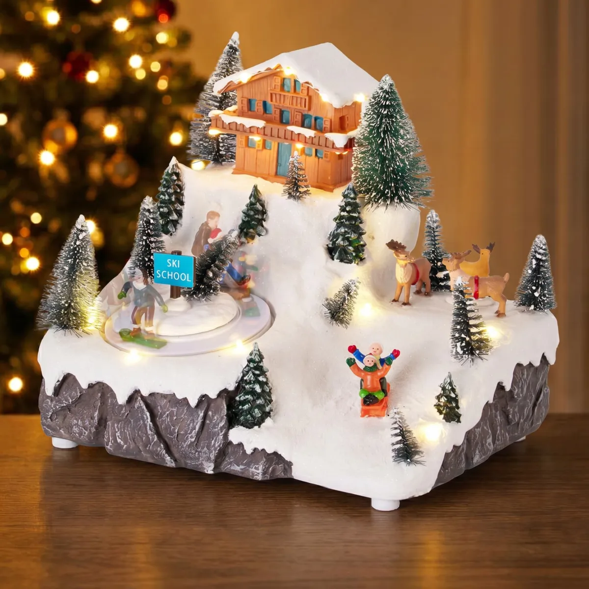 Villaggio di Natale animato e musicale a pile (H22 cm) Il Rifugio delle Feste