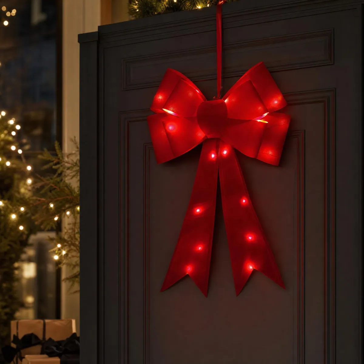 Fiocco natalizio gigante luminoso a pile 25 LED (H61 cm) Dolce Notte Rosso