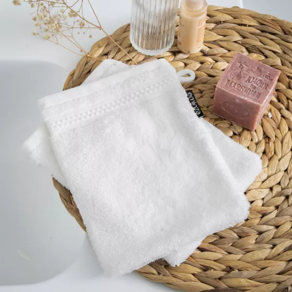 Conjunto de 2 guantes de ba�o de algod�n org�nico. (15 x 21 cm) M�line Blanco chantilly