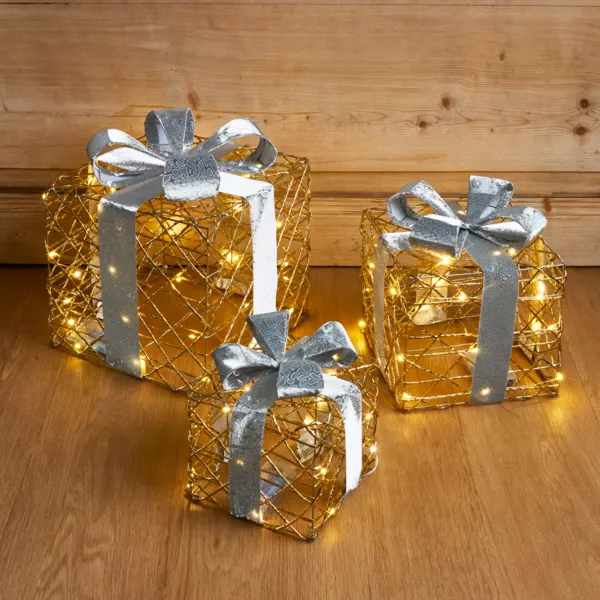 Sæt med 3 lysende gaver på batteri 90 LED (H29 cm) Festlig Guld og varm hvid