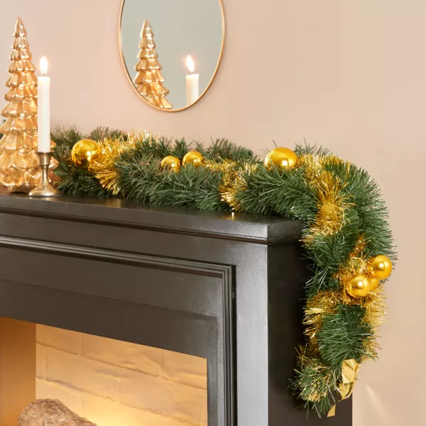 Versierde guirlande Kerst goudkleurig