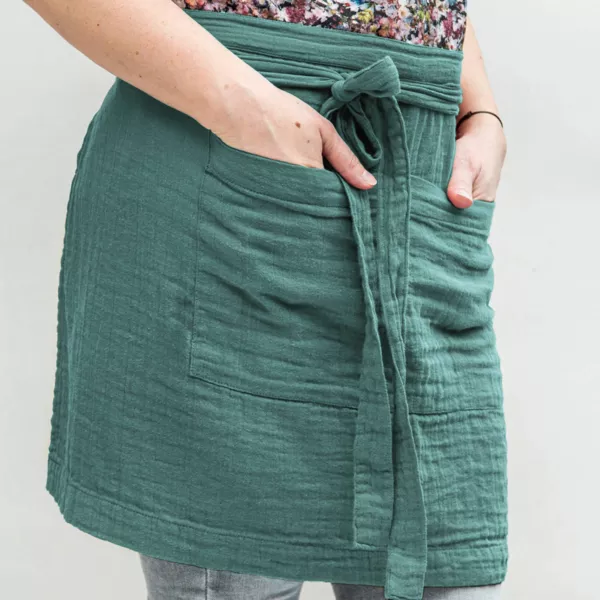 Musselin-Kochsch�rze mit Taschen Ga�a Petrolblau